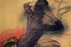 seated-woman-adjusting-her-hair