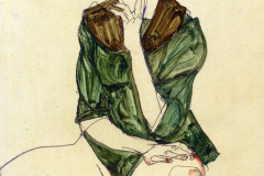 sitting-woman-in-a-green-blouse-1913