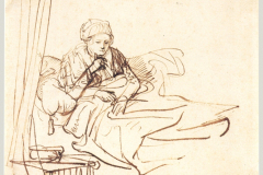 a-woman-sitting-up-in-bed