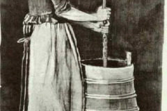 woman-churning-butter-1881