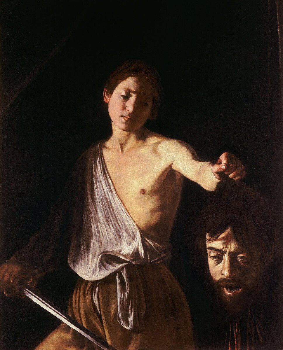 Caravaggio'nun Golyat'ın Başını Tutan Davut tablosu: karanlıkta kesik başı tutan hüzünlü genç