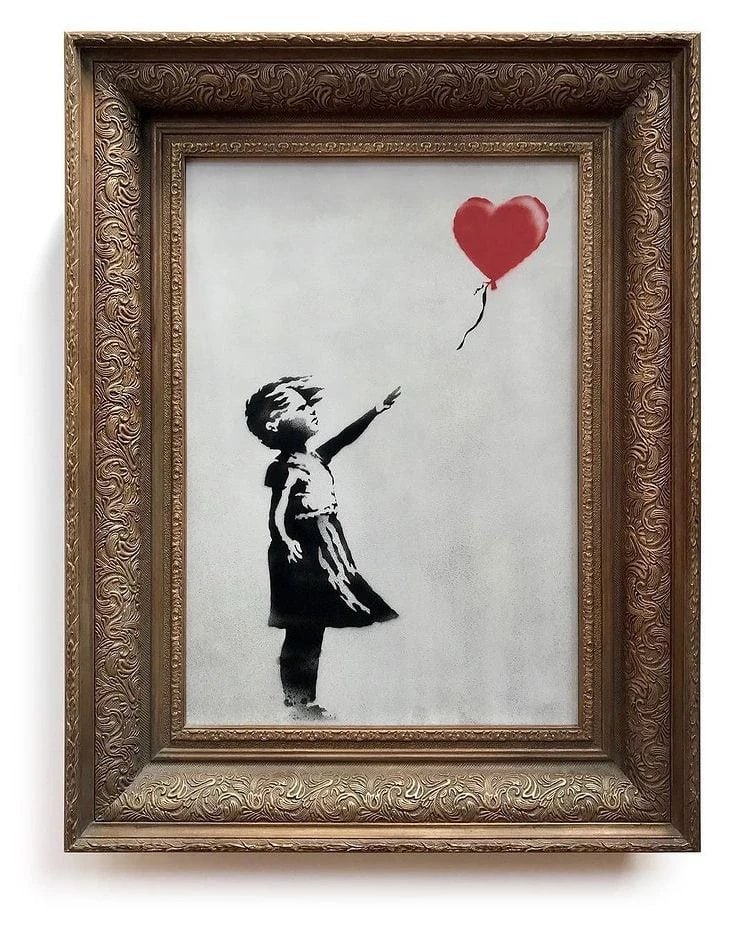 Balonlu Kız, Banksy: kırmızı kalp balona uzanan kız, altın çerçevede