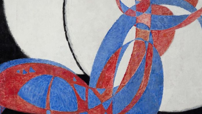 František Kupka'nın Amorpha, İki Renkte Füg tablosundan bir ayrıntı: beyaz daireler üzerinde kırmızı ve mavi kıvrımlı şeritler